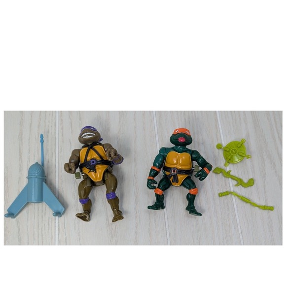 playmates toys Other - Playmates TMNT Sewer Swimmin Donatello Rock N Roll Michelangelo wind up figures